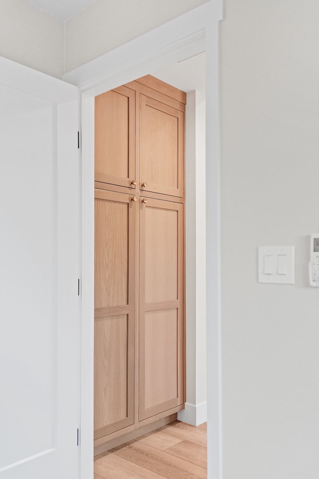 Custom natural wood built-in storage